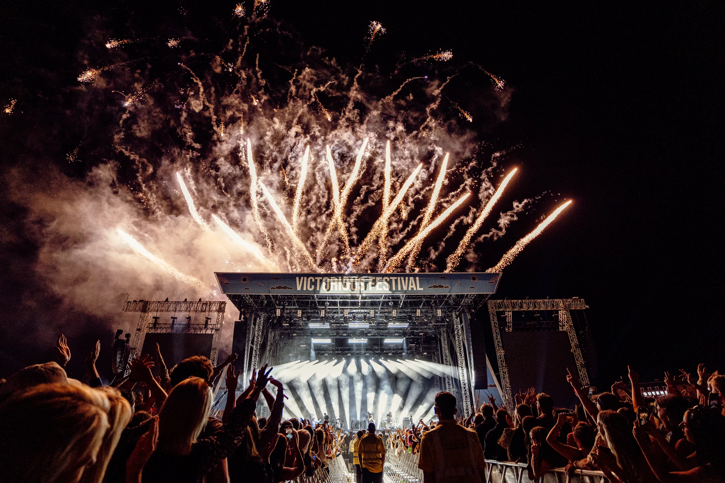 Fireworks lighting up behind the stage at Victorious Festival
